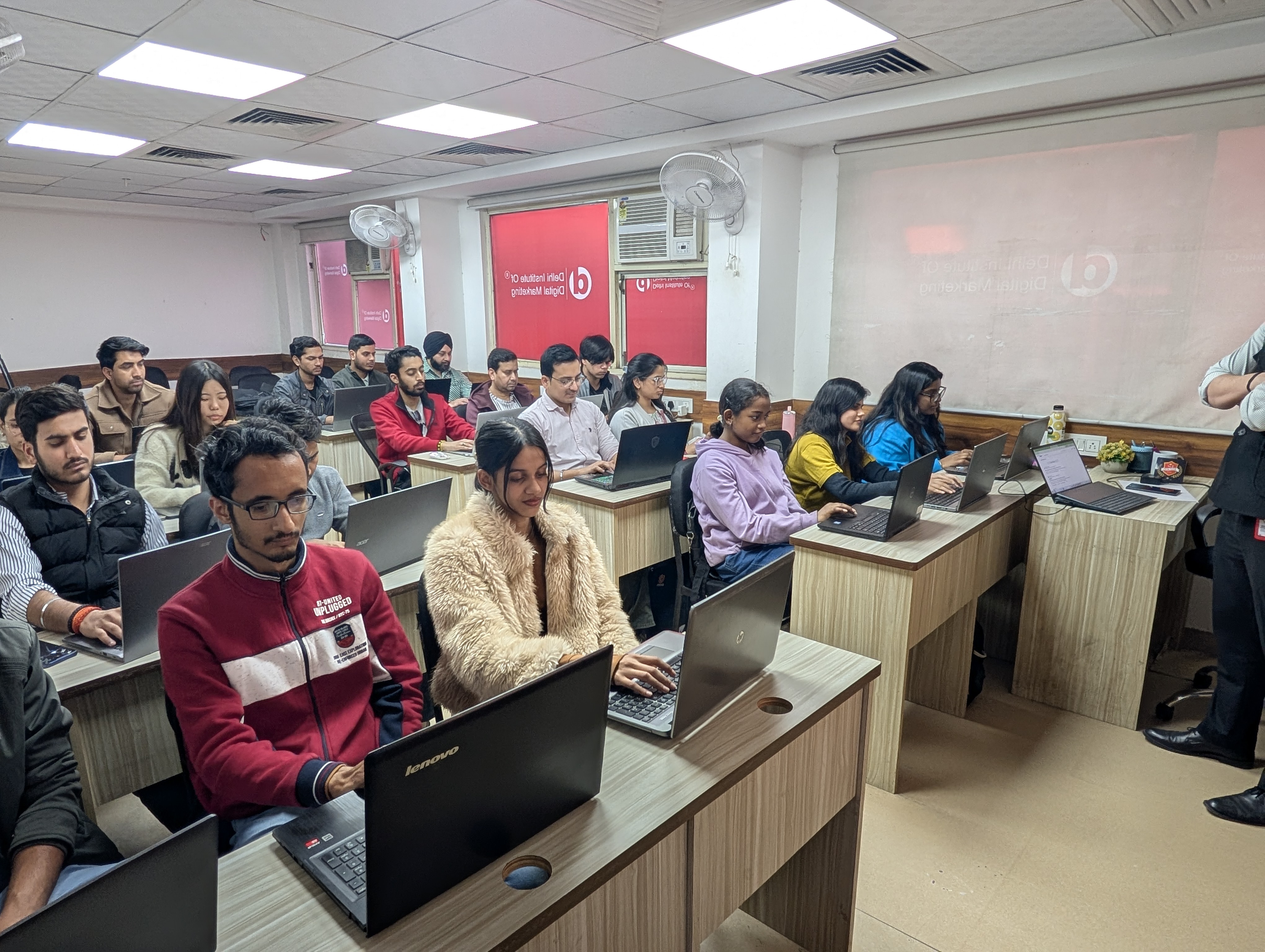 Students practicing AI tools in digital marketing at DIDM Noida